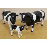 A TRIO OF BESWICK FRIESIAN CATTLE