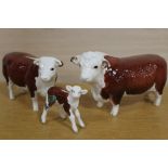 A TRIO OF BESWICK HEREFORD CATTLE