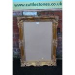 A MODERN GILT RECTANGULAR PICTURE FRAME - REBATE 75 X 50 CM