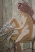 AN UNFRAMED OIL ON BOARD OF A SEATED FEMALE NUDE DRYING HER FEET SIZE - 66CM X 46CM