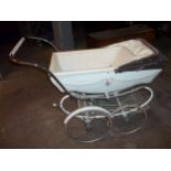 A VINTAGE SILVER CROSS PRAM