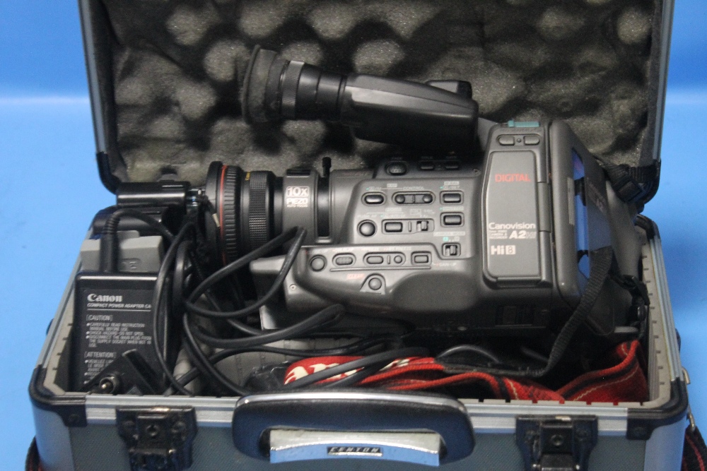 A CANON CAMCORDER IN FITTED CASE