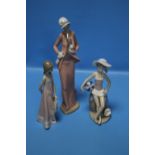 TWO LLADRO FIGURINES AND A NAO FIGURINE (3)