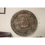 A HANGING WALL PLAQUE IN THE CLASSICAL STYLE, Diam 50 cm, the plaque is copper alloy and was once