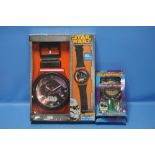 A BOXED STAR WARS WALLCLOCK AND A THUNDERBIRDS DVD AND TOY GIFT SET A/F