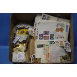 A BOX OF FIRST DAY COVERS, TEA CARDS ETC.