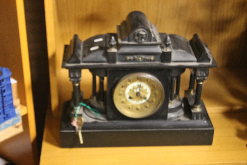 A VICTORIAN BLACK MARBLE CLOCK