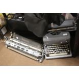 AN IMPERIAL TYPEWRITER TOGETHER WITH A BRIEFCASE