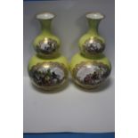 A PAIR OF MEISSEN PORCELAIN YELLOW GOURD VASES WITH HAND PAINTED PANELS OF FIGURES TO ONE SIDE