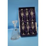 A BOXED SET OF EDINBURGH CRYSTAL GLASSES TOGETHER WITH A ROYAL DOULTON CUT GLASS DECANTER