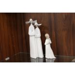 A LARGE LLADRO FIGURE GROUP OF TWO NUNS TOGETHER WITH A SMALLER NAO FIGURE OF A GIRL WITH A PUPPY