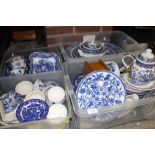 A LARGE QUANTITY OF ASSORTED BLUE AND WHITE CHINA TO INCLUDE TEAPOTS, TUREENS, MEAT PLATES ETC