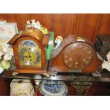 A REPRODUCTION HERMLE MOON PHASE MANTEL CLOCK TOGETHER WITH A WALNUT EXAMPLE