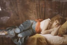 A GILT FRAMED AND GLAZED PARTIALLY OVER PAINTED PRINT OF A WOMAN RESTING BY PAUL TILLIER PICTURE