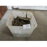 A BOX OF VINTAGE FURNITURE HANDLES AND HINGES ETC.