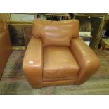 A TAN LEATHER CHAIR - SIGNS OF WEAR