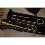 A CASED JUPITER TROMBONE