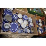 TWO TRAYS OF WEDGWOOD BLUE DIPPED JASPERWARE TO INCLUDE A TEAPOT, CUPS AND SAUCERS ETC.