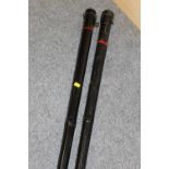 A VINTAGE CORK HANDLED SNOOKER CUE BY BURROUGHS AND WATTS LTD OF LONDON, IN METAL CARRY CASE,