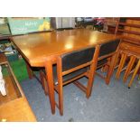 A RECTANGULAR EXTENDING DINING TABLE & SET OF FOUR RETRO STYLE DINING CHAIRS BY BCM (BATH CABINET