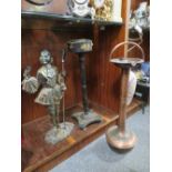 A JAPANESE STYLE LACQUER WARE SMOKERS STAND TOGETHER WITH A COPPER EXAMPLE AND A CAST METAL FIRE