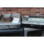 A NISBETS ESSENTIALS DA397 GRIDDLE TOGETHER WITH A BOXED CROFTON BUFFET SERVER