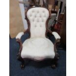 AN UPHOLSTERED MAHOGANY FRAMED SPOON BACKED CHAIR WITH MODERN DAMASK UPHOLSTERY