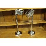 A PAIR OF DECORATIVE CHROME EFFECT MICROPHONES