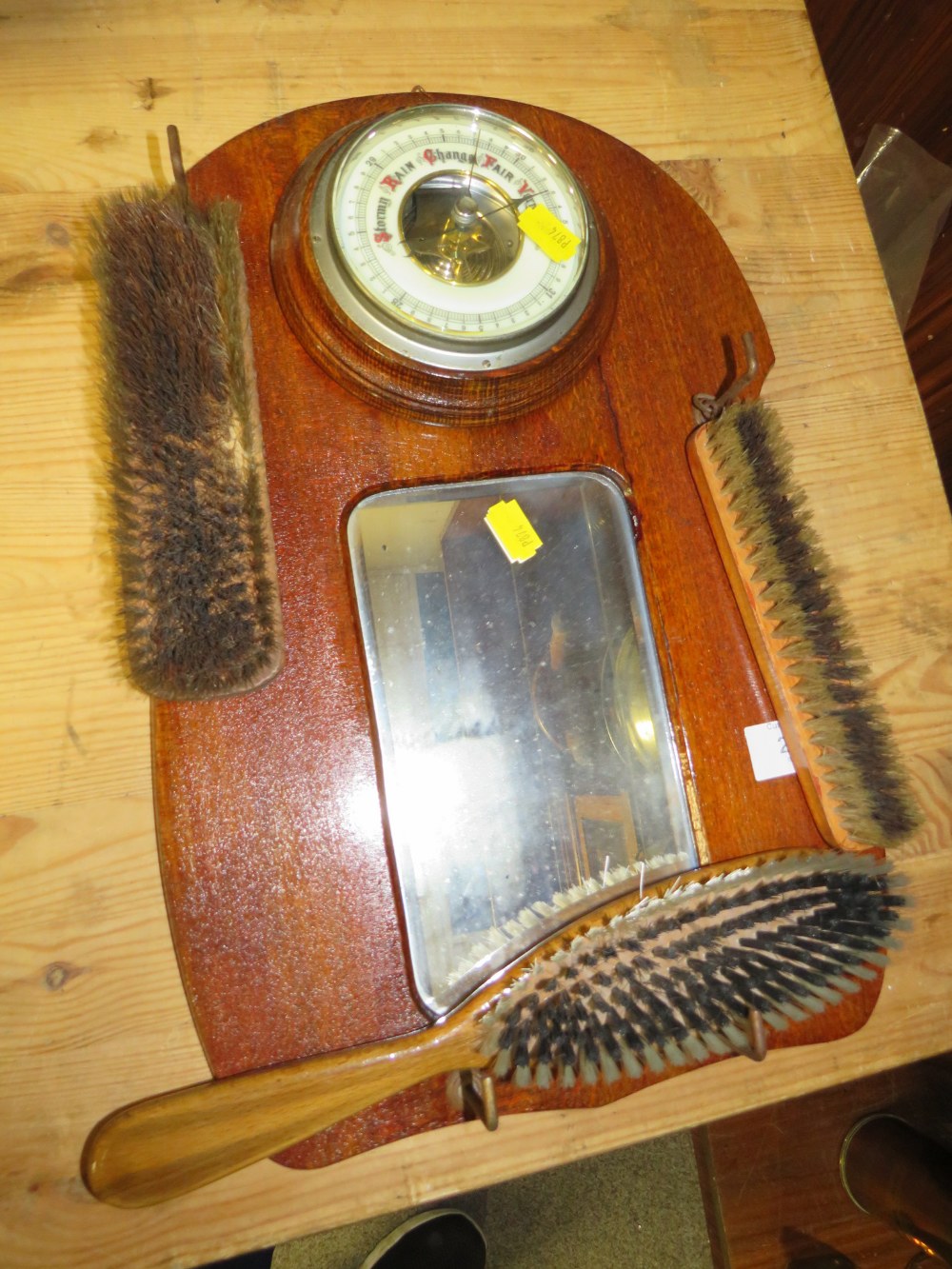 A VINTAGE OAK WALL MOUNTED VALET WITH BAROMETER AND MIRROR TOGETHER WITH A PAIR OF BARLEY TWIST