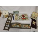 A QUANTITY OF CIGARETTE CARDS