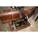 TWO VINTAGE CASED SINGER SEWING MACHINES