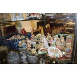 A LARGE QUANTITY OF CHERISHED TEDDIES TOGETHER WITH AN OLD LEATHER BOOK COVER