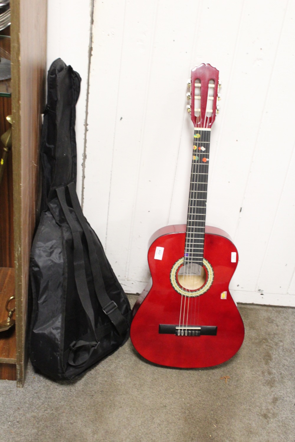 A CHILDS MIGUEL ALMERA PURE SERIES CLASSIC ACOUSTIC GUITAR IN CHERRY RED FINISH, WITH SOFT CARRY