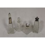 A HALLMARKED SILVER BANDED PERFUME BOTTLE TOGETHER WITH THREE OTHER BOTTLES