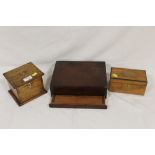 AN OAK TWO SECTION TEA CADDY TOGETHER WITH A SIMILAR SINGLE SECTION TEA CADDY AND A MAHOGANY BOX (