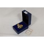 A BOXED HALCYON DAYS ENAMELS TIGER SHAPED PILL BOX - DAMAGE TO ONE EAR