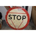 A LARGE METAL STOP SIGN