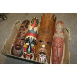 FOUR WOODEN AFRICAN MASKS