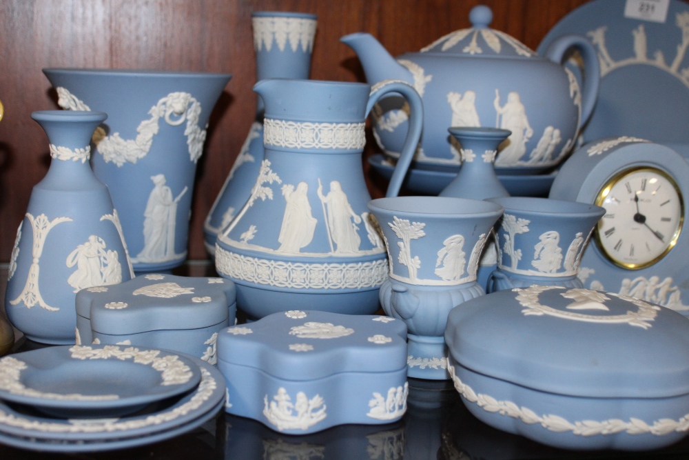 A LARGE QUANTITY OF BLUE WEDGWOOD JASPERWARE TO INCLUDE A TEAPOT, FRUIT BOWL, MANTEL CLOCK ETC. ( - Image 4 of 4