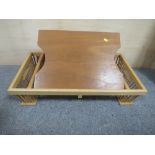 AN ADJUSTABLE WOODEN TRAY TABLE