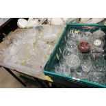 THREE TRAYS OF MOSTLY CUT GLASS TO INCLUDE DECANTERS, DRINKING GLASSES ETC.