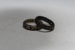 TWO 9CT GOLD AND SILVER ETERNITY RINGS