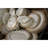 A TRAY OF GILDED RICHMOND DINNERWARE TO INCLUDE TUREENS, DINING PLATES ETC.