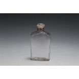 AN ANTIQUE CUT GLASS FLASK