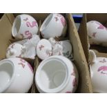 A QUANTITY OF BOXED DENISE O'SULLIVAN CERAMIC FLAMINGO PATTERN JUGS AND SUGAR BOWLS