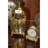 A REPRODUCTION SMITHS MANTEL CLOCK TOGETHER WITH A SWIZA MIGNON METAL MANTEL CLOCK (2)
