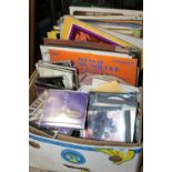 A BOX OF LP RECORDS, 7" SINGLES AND CDS ETC. TO INCLUDE GLEN MILLER, ELVIS ETC.