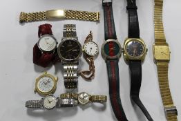 A BAG OF WRISTWATCHES TO INCLUDE A 9 CT GOLD CASED EXAMPLE ON 9 CT GOLD EXPANDABLE STRAP -