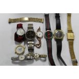A BAG OF WRISTWATCHES TO INCLUDE A 9 CT GOLD CASED EXAMPLE ON 9 CT GOLD EXPANDABLE STRAP -
