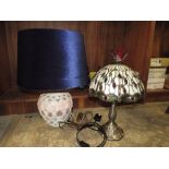 A TIFFANY STYLE TABLE LAMP WITH DRAGONFLY PATTERN SHADE TOGETHER WITH A CERAMIC TABLE LAMP AND